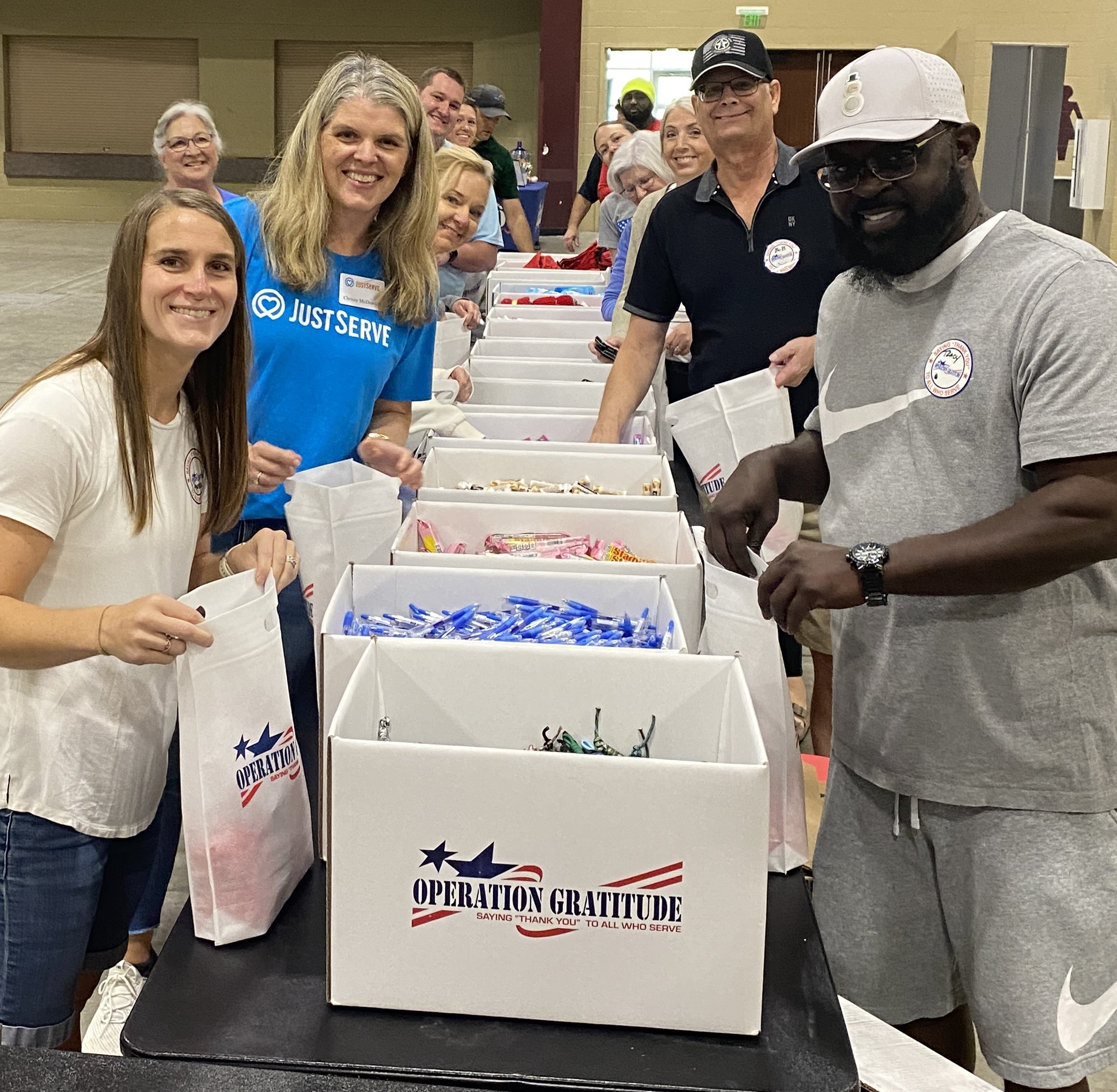Community volunteers packing Operation Gratitude boxes in Charleston