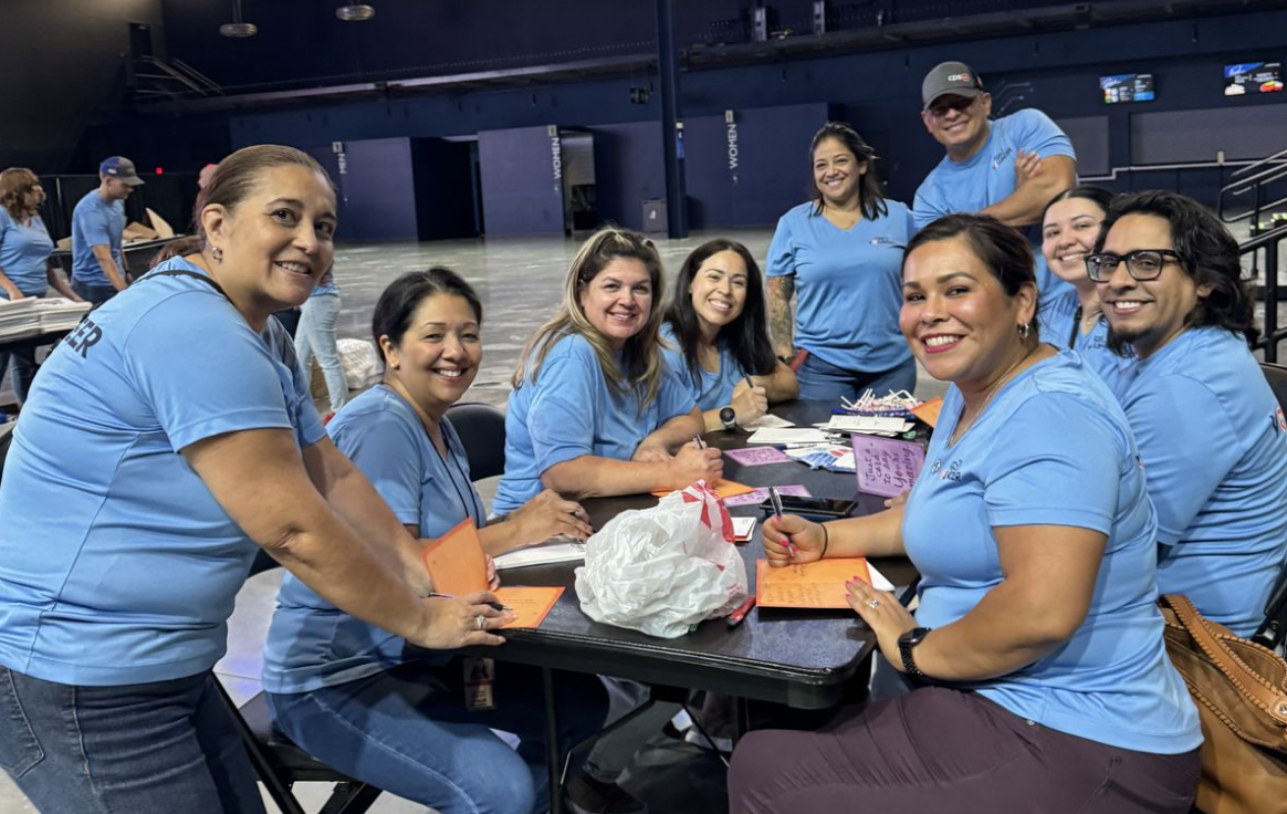 Volunteer team writing letters of gratitude