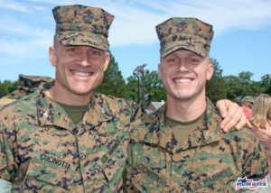 Two generations of Marines - father and son standing together