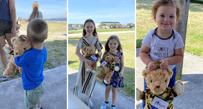 Military family members show the contents of their Operation Gratitude care package.