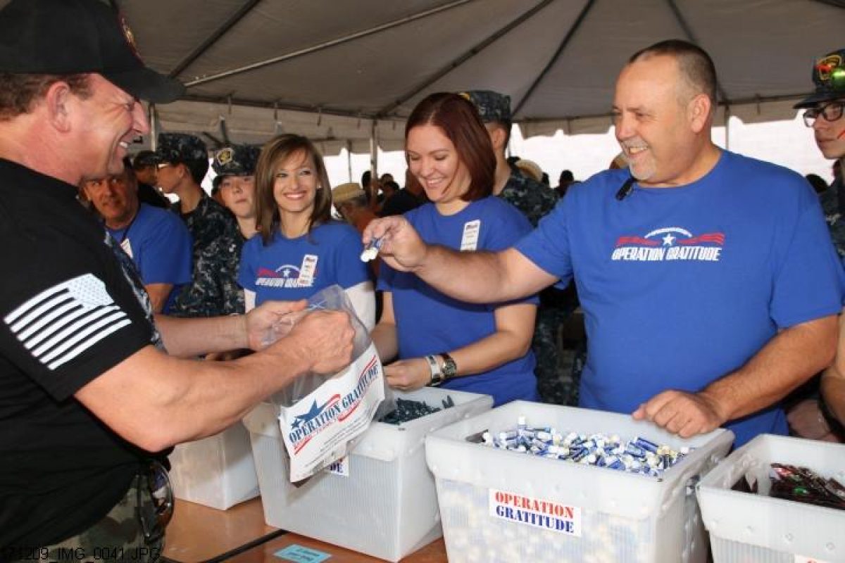Volunteers assembling Care Kits for First Responders and Deployed Troops.